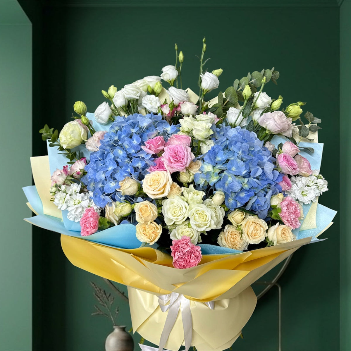 Blue hydrangeas and Lisianthus spray roses mixed bouquet